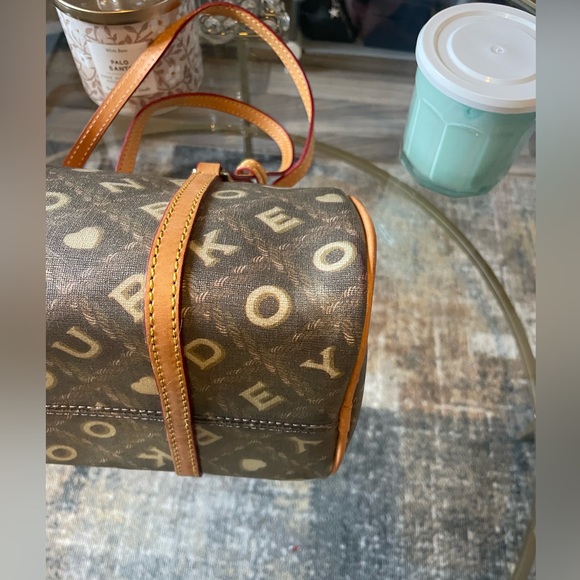 Dooney & Bourke (rare!!)
Barrel Brown/Tan/Cream Color Writing (Coffee) duffle - Picture 2 of 10